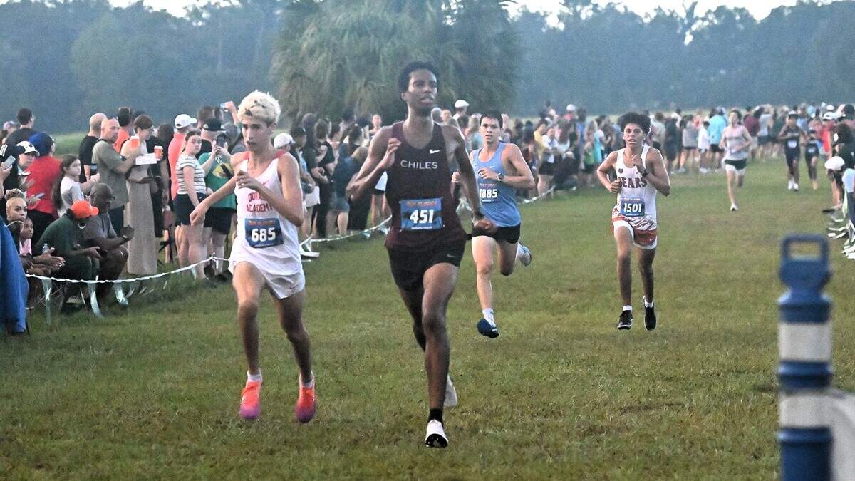 Martin Fernandez (left) of the Doral Academy boys’ cross-country team. Martin Fernandez (left) of the Doral Academy boys’ cross-country team.